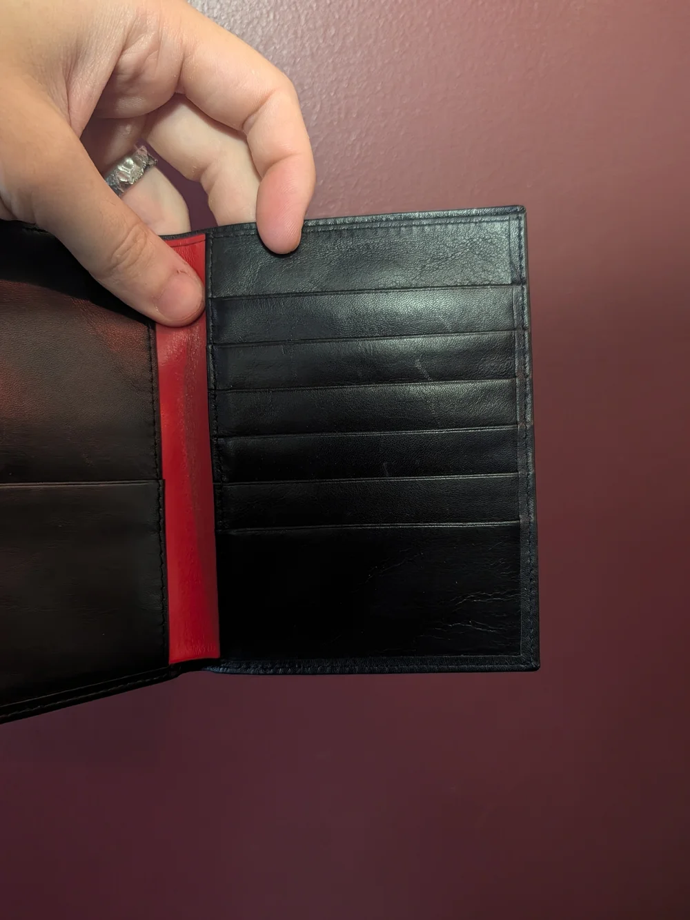 FERRARI Black Leather Passport Wallet with Embossed Shield Logo Red Inside